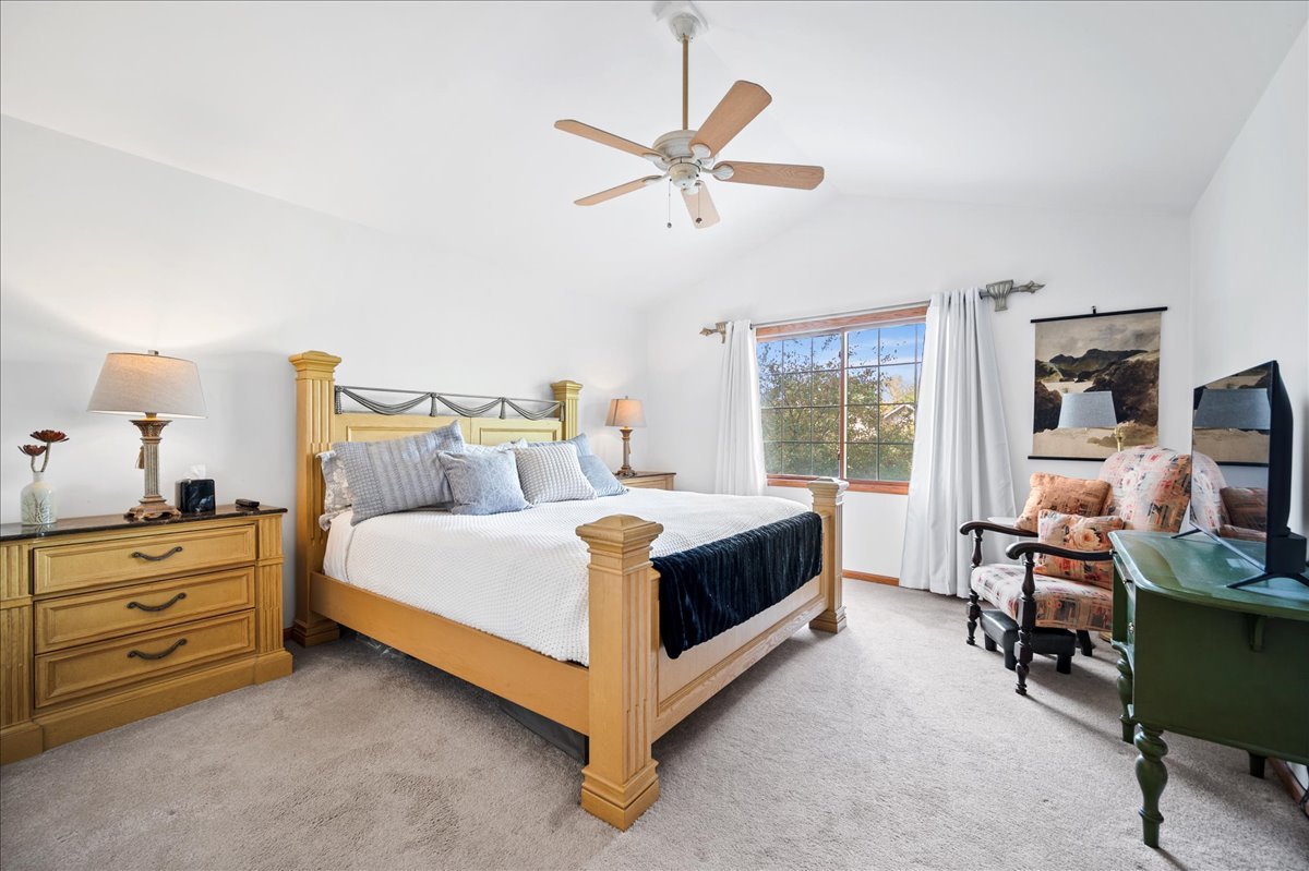 103 Fawn Lane Elgin, IL 60120 - Photo 22 of 31 a bed room with a bed and a window
