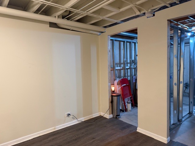 103 Fawn Lane Elgin, IL 60120 - Photo 25 of 31 a view of a room with wooden floor and closet