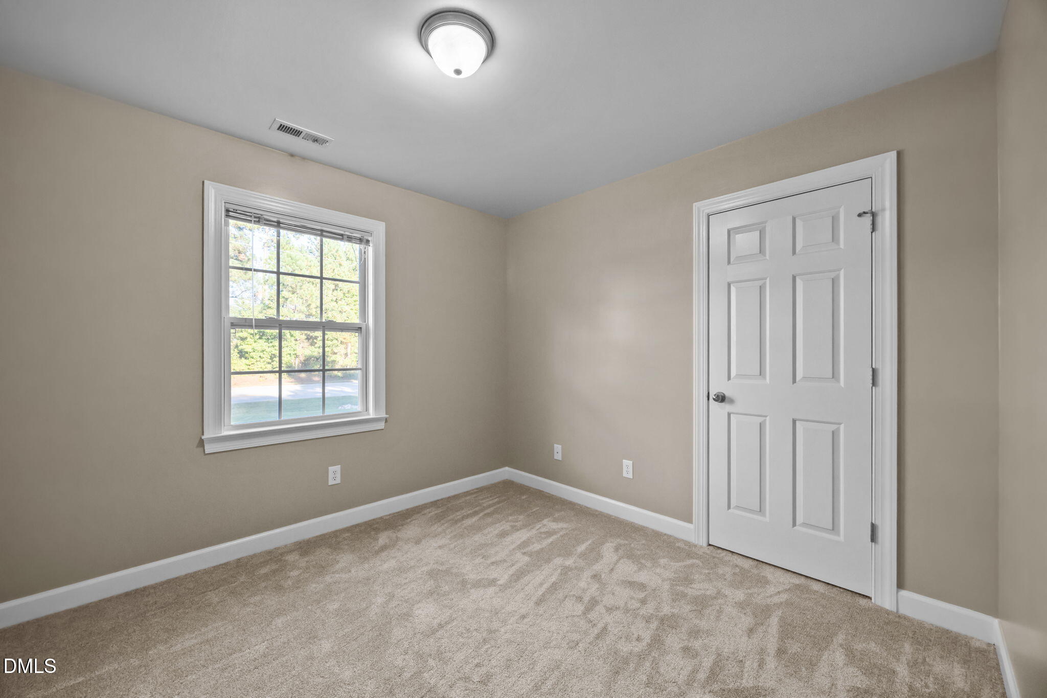 505 Vinson Road Clayton, NC 27527 - Photo 25 of 31 an empty room with windows