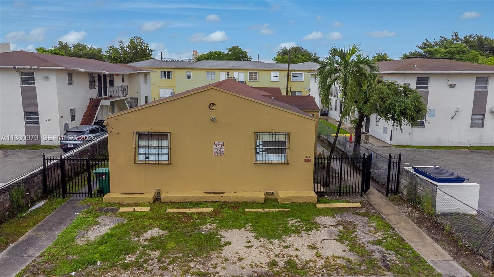 1345 Southwest 7th Street Miami, FL 33135 - Photo 35 of 37 a front view of house with yard
