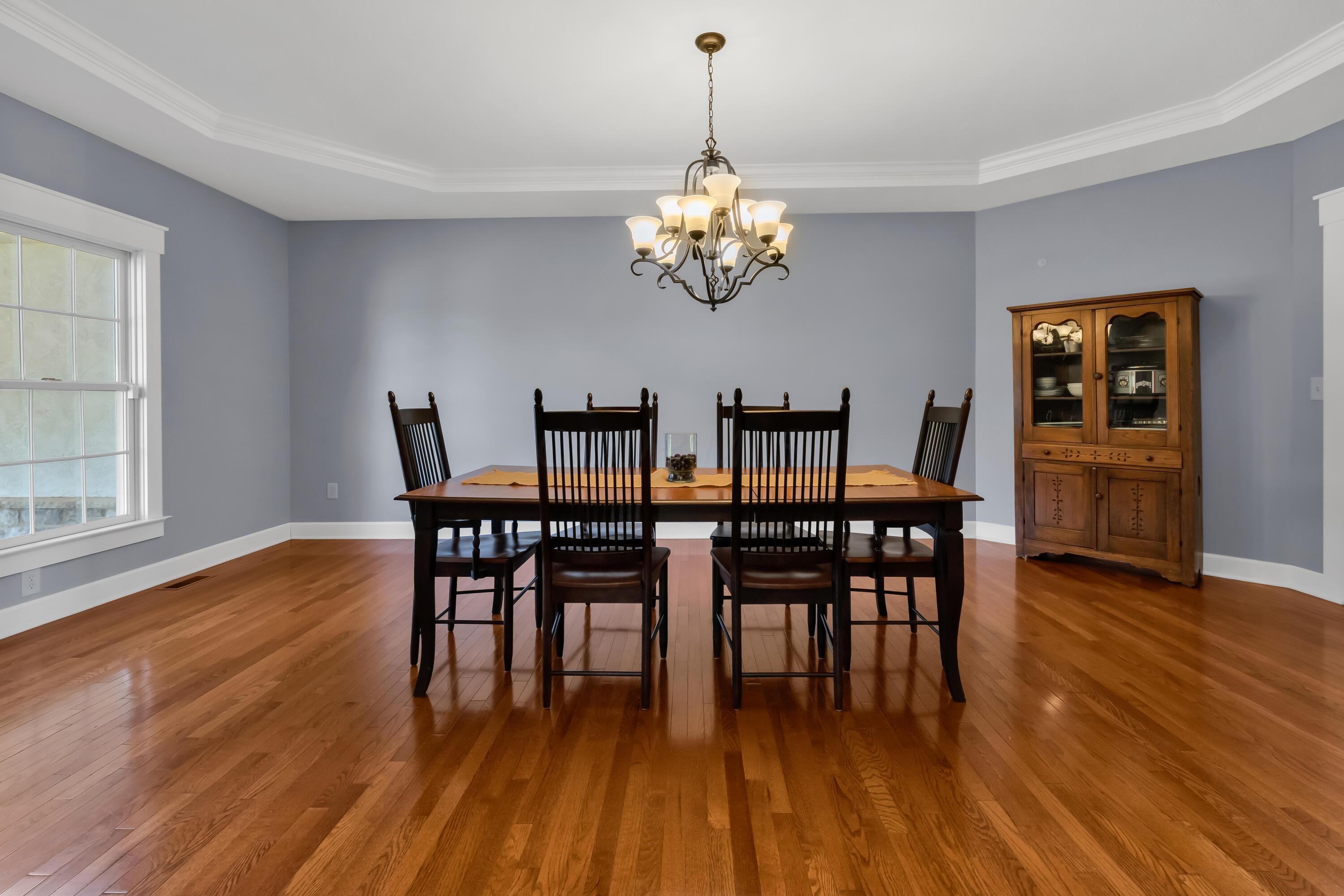 16689 Bailor Road Laurelville, OH 43135 - Photo 8 of 73 • Hardwood flooring
• Grey painted walls
• Tray ceiling
• Chandelier