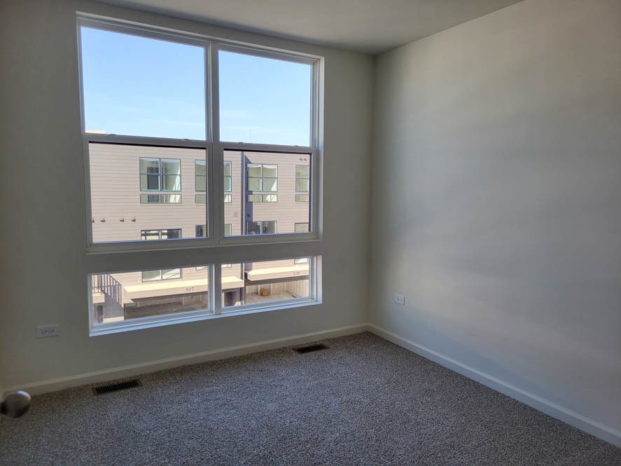356 Summit Circle Lombard, IL 60148 - Photo 7 of 38 an empty room with a window