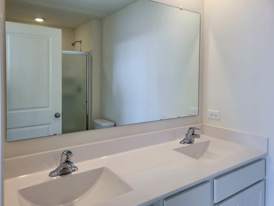 356 Summit Circle Lombard, IL 60148 - Photo 9 of 38 a bathroom with a sink and a mirror