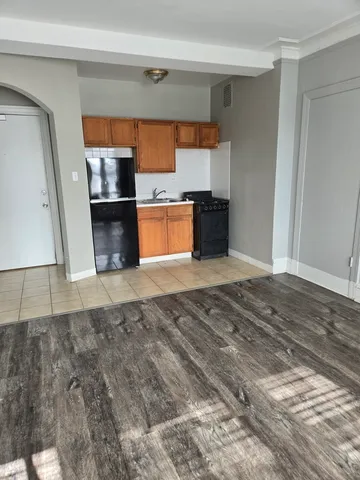 a view of a kitchen with a sink