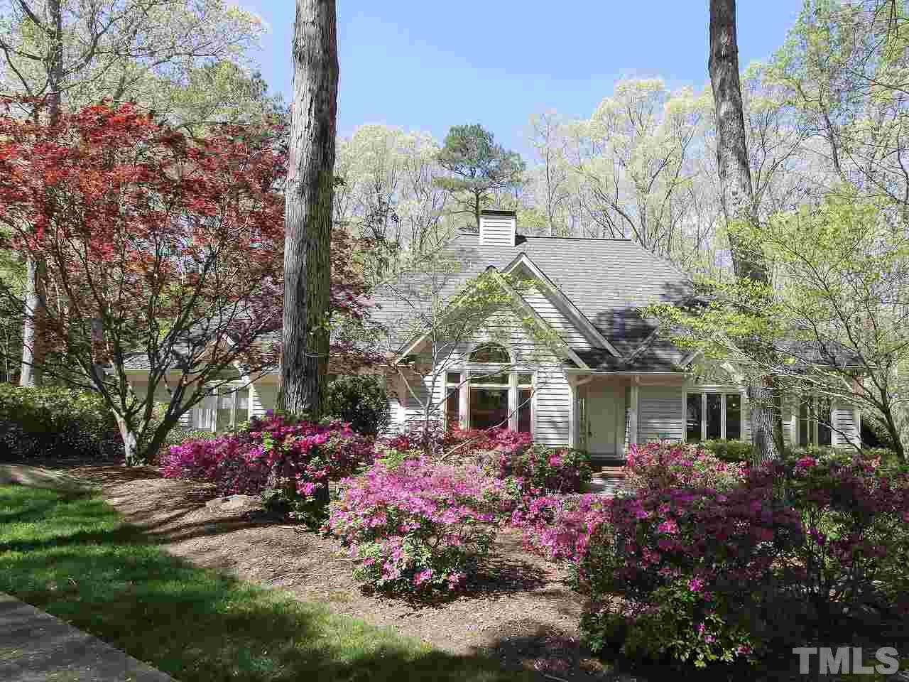 616 Booth Road Chapel Hill, NC 27516 - Photo 2 of 26 a front view of a house with a garden