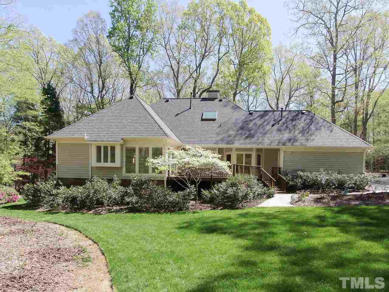 616 Booth Road Chapel Hill, NC 27516 - Photo 23 of 26 a front view of house with yard and green space