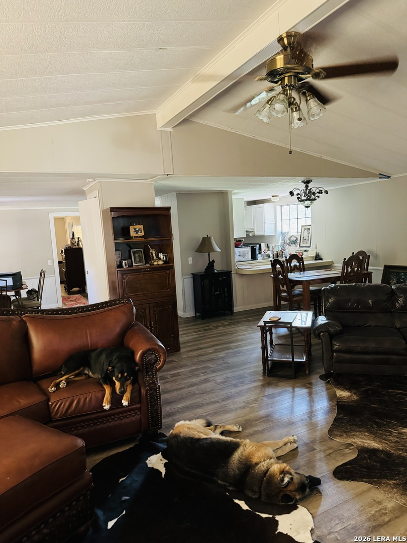 8790 Whartons Dock Road Bandera, TX 78003 - Photo 4 of 12 a living room with furniture and kitchen view