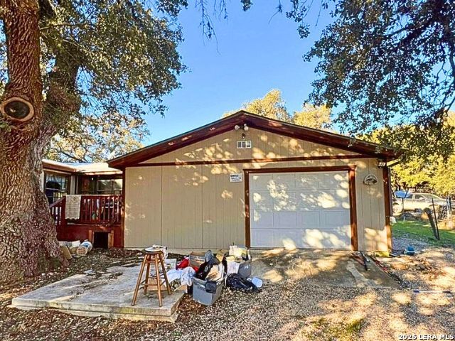 8790 Whartons Dock Road Bandera, TX 78003 - Photo 10 of 12 a view of backyard with a patio
