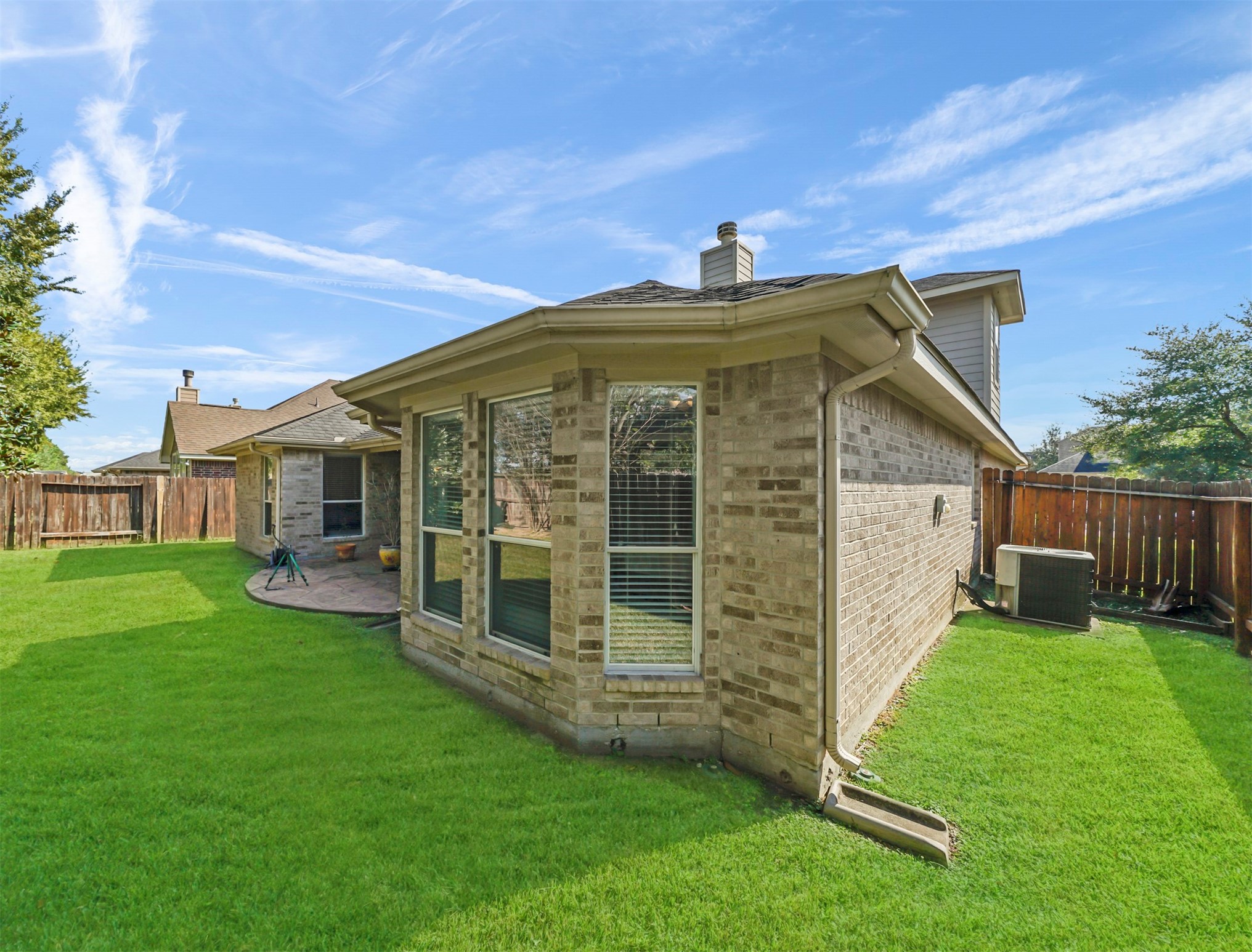8214 Garrison Point Drive Houston, TX 77040 - Photo 31 of 37 a front view of a house with a yard