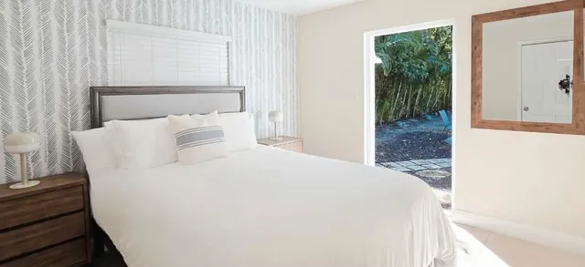 a living room with fireplace furniture and a fireplace