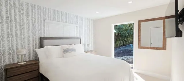 a living room with furniture a window and a fireplace