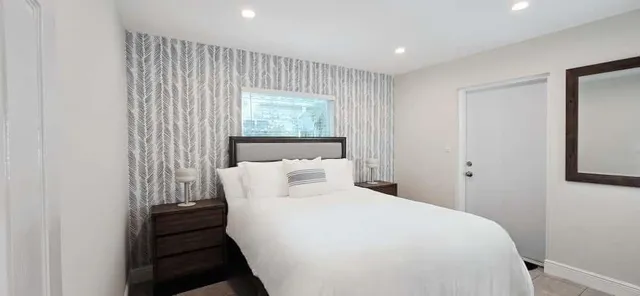 a backyard of a house with lots of green space