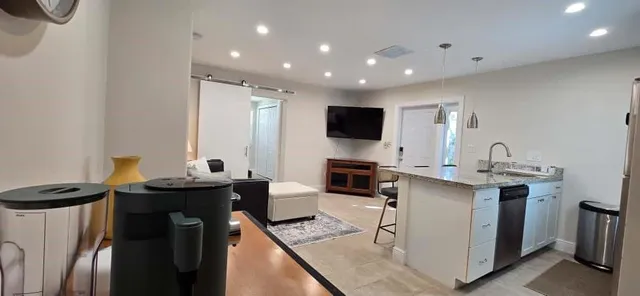 a living room with furniture and a table