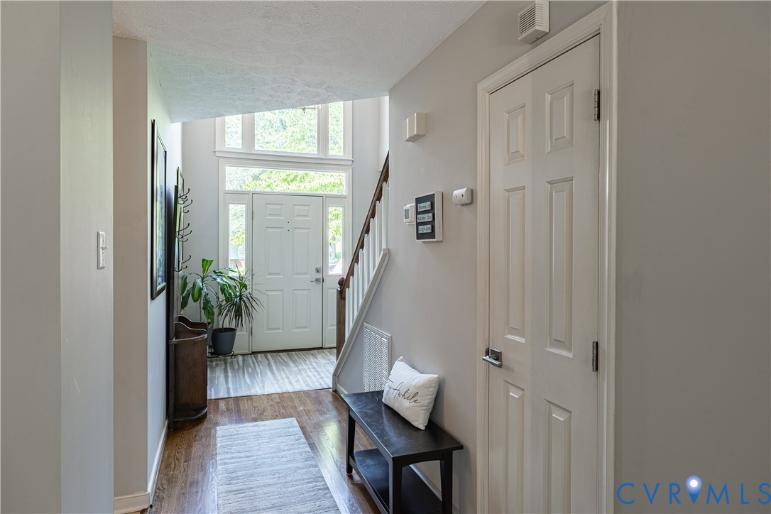 4501 Foxwood Road Chester, VA 23831 - Photo 17 of 42 Two-story foyer featuring a paneled entry door wit
