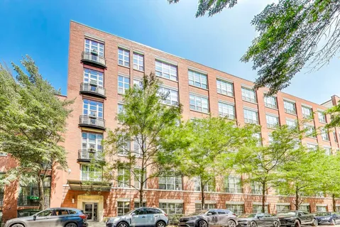 a front view of a building with street view