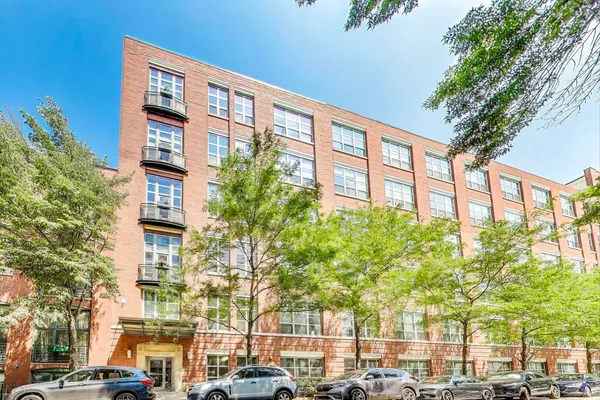 a front view of a building with street view