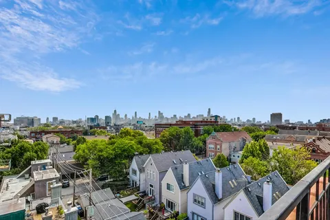 a view of a lounge chairs in a patio