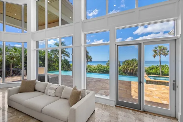 a living room with furniture a floor and window
