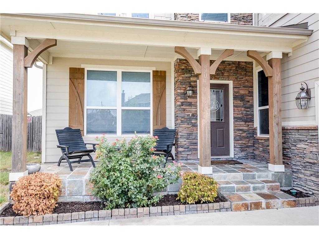6904 Cotton Seed Drive McKinney, TX 75070 - Photo 2 of 10 a front view of a house with garden