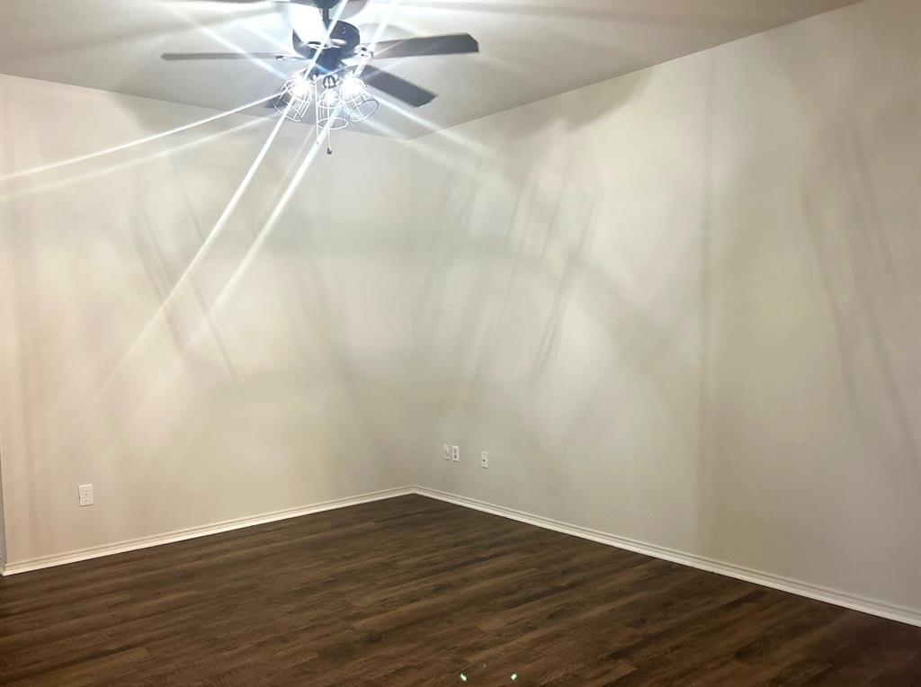 6904 Cotton Seed Drive McKinney, TX 75070 - Photo 5 of 10 wooden floor in a empty room
