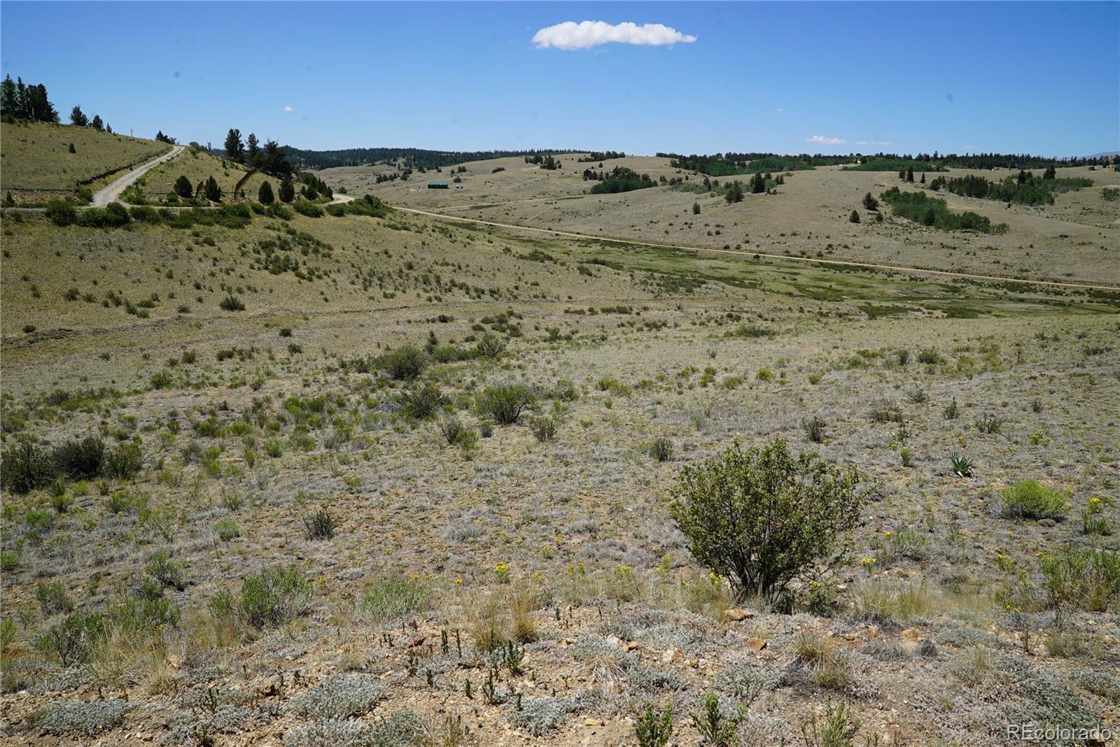 1053 Lippzana Road Jefferson, CO 80456 - Photo 3 of 4 a view of beach with ocean view