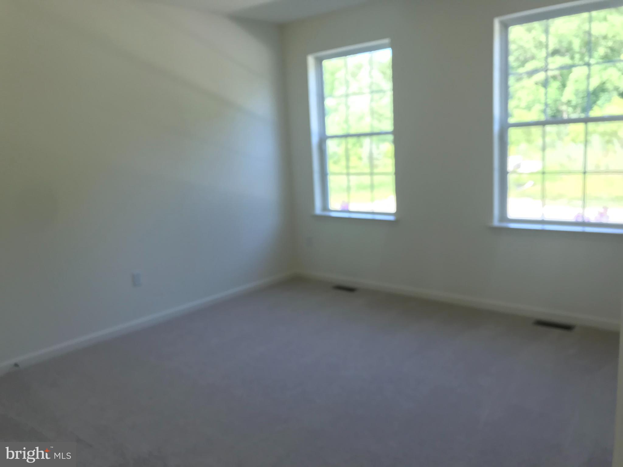 116 Grissom Drive Bear, DE 19701 - Photo 8 of 25 an empty room with a window