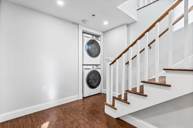 a view of stairs with wooden floor