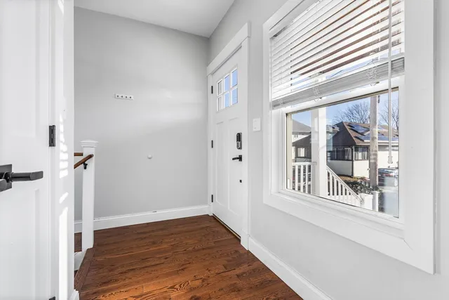 a view of a room that has a window in it