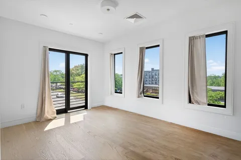 $899,000 | 50-56 Leo M Birmingham Parkway, Unit 302, Boston, MA 02135