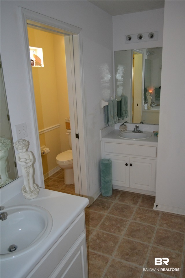 8723 Patterson Path Lillian, AL 36549 - Photo 20 of 46 Bedroom 3 has direct access to this bathroom
