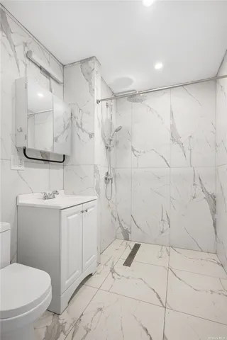 a kitchen with a sink appliances and cabinets