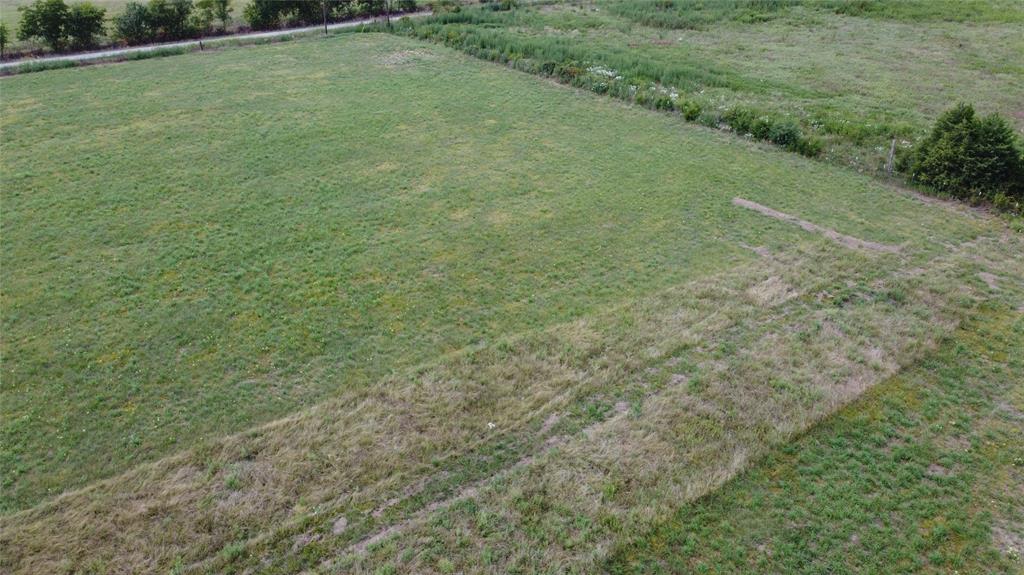 720 County Road 2105 Cooper, TX 75432 - Photo 3 of 6 a view of a field with grass