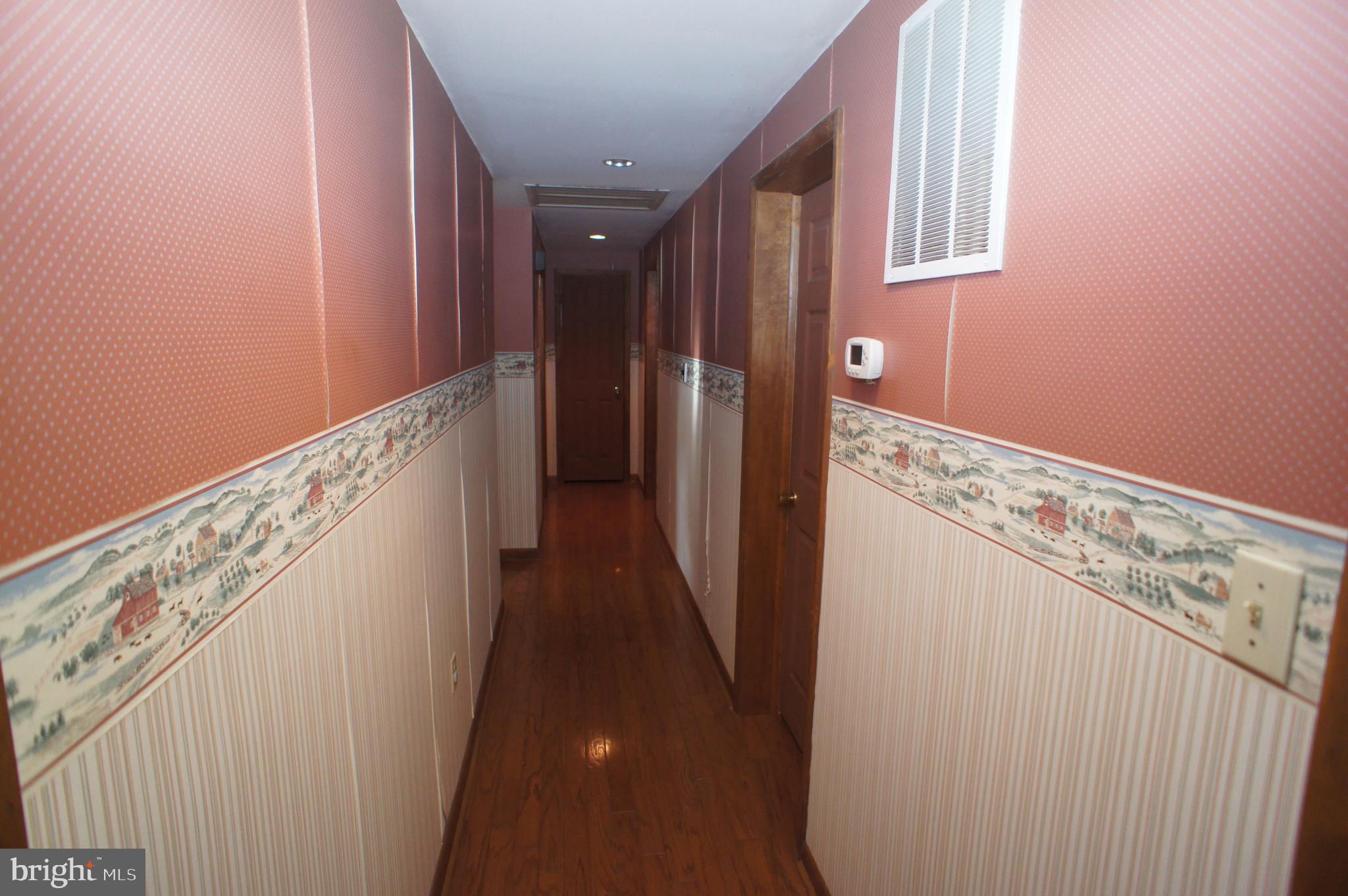 10459 Frederick Road Ellicott City, MD 21042 - Photo 27 of 32 Hallway - Home has Bruce Hardwoods