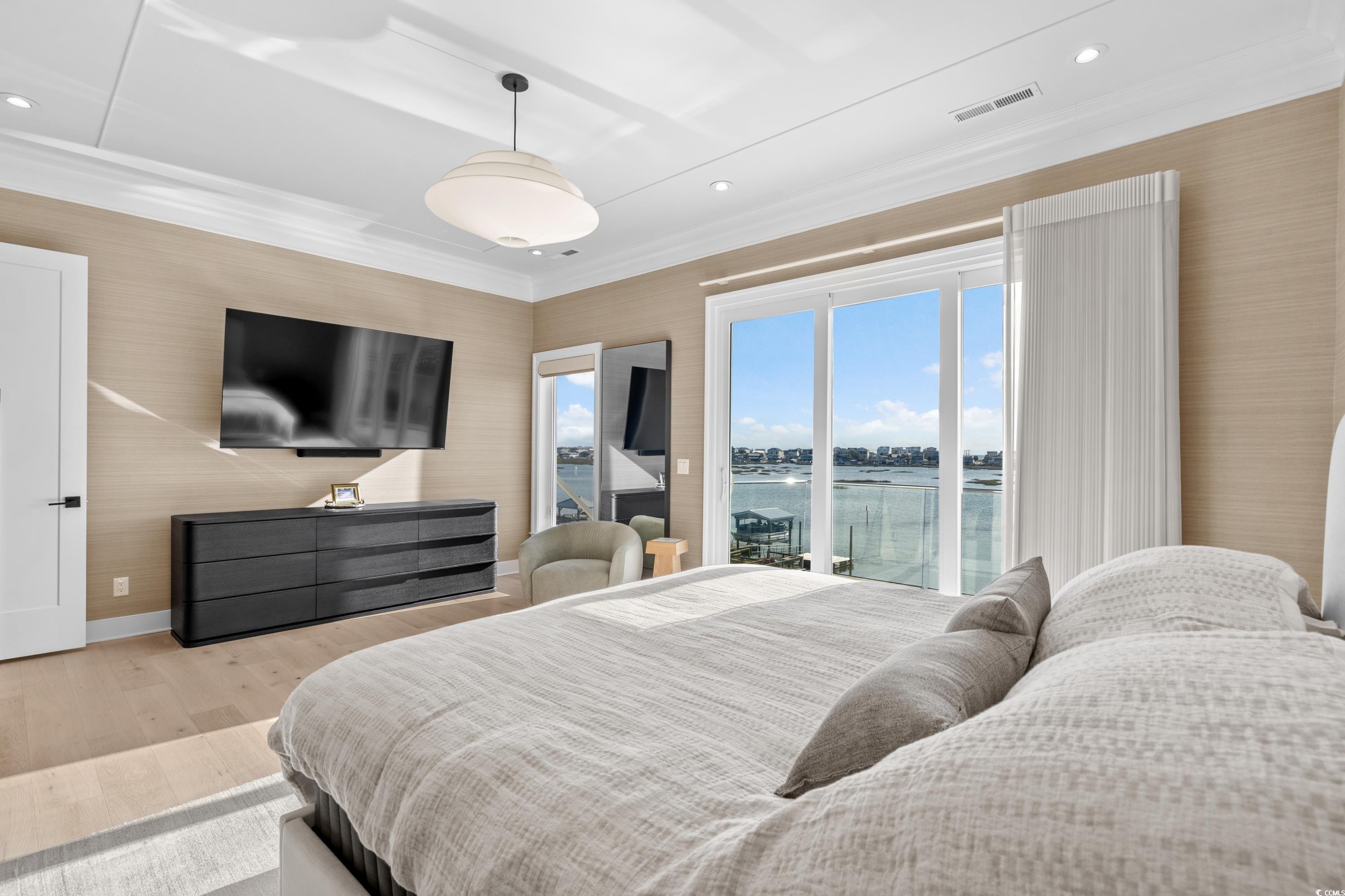 3109 State Rd S-26-816 Murrells Inlet, SC 29576 - Photo 26 of 40 Bedroom featuring access to outside and light wood-type flooring