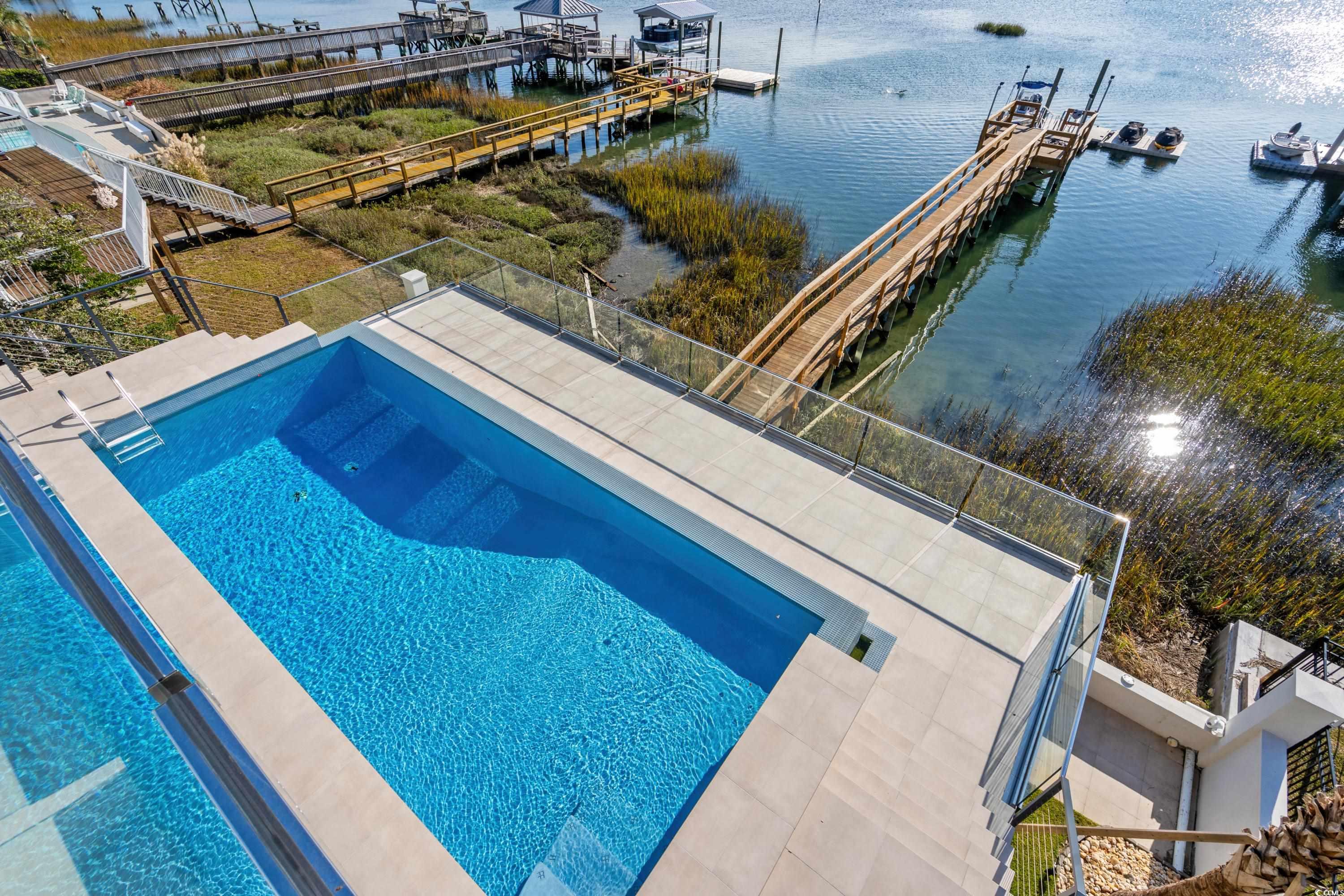 3109 State Rd S-26-816 Murrells Inlet, SC 29576 - Photo 32 of 40 View of pool with a water view
