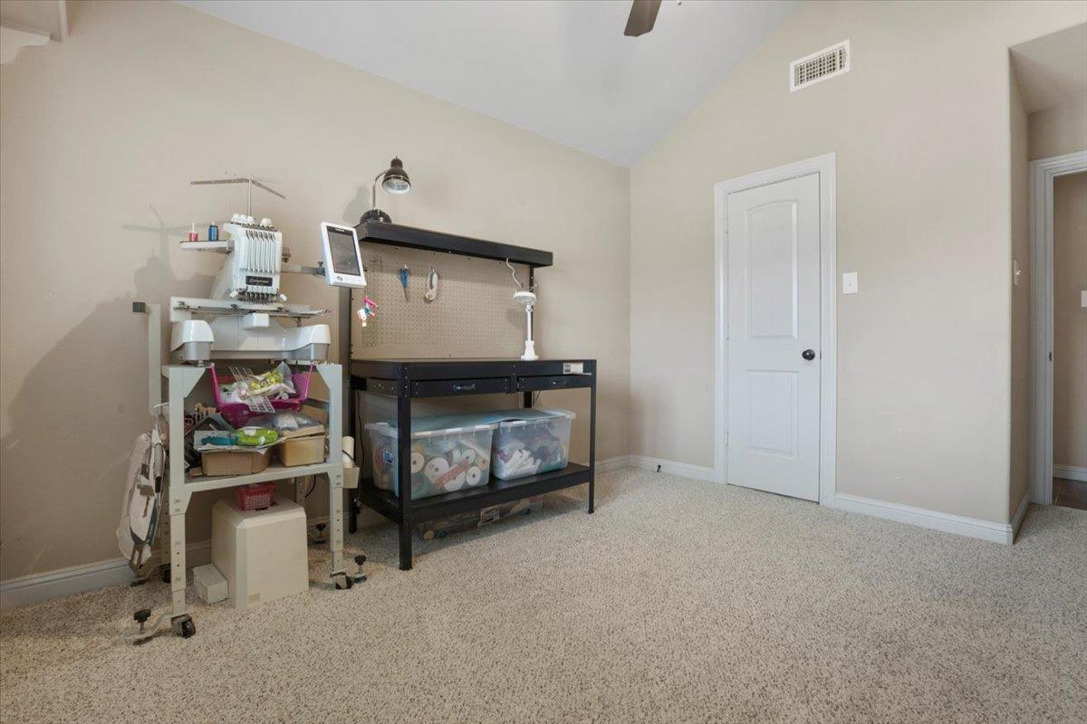 1125 17th Street Shallowater, TX 79363 - Photo 19 of 32 a bedroom with bunk bed