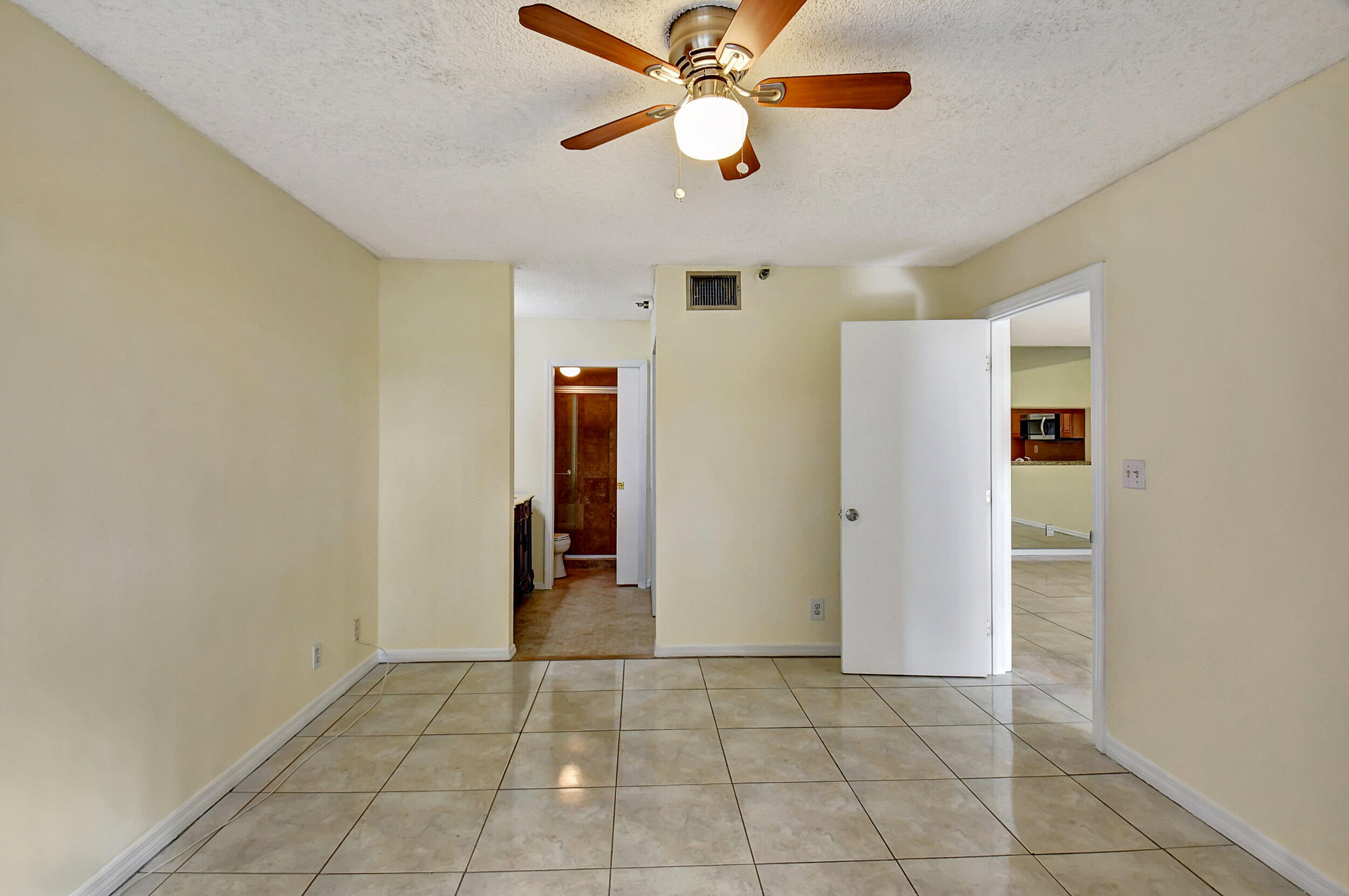 440 Northwest 67th Street, Unit H102 Boca Raton, FL 33487 - Photo 15 of 34 Primary Bedroom