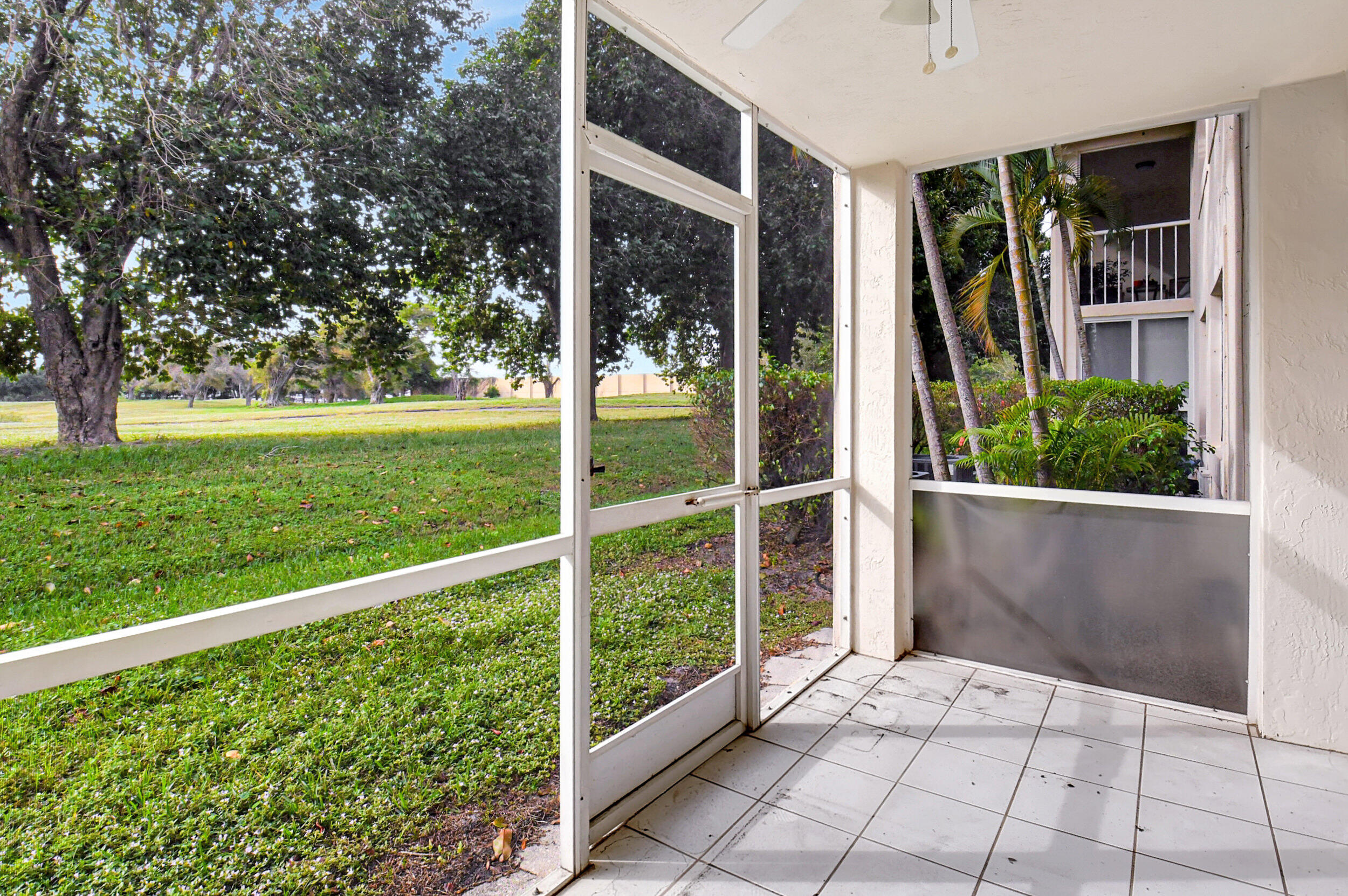 440 Northwest 67th Street, Unit H102 Boca Raton, FL 33487 - Photo 27 of 34 Screened in Patio