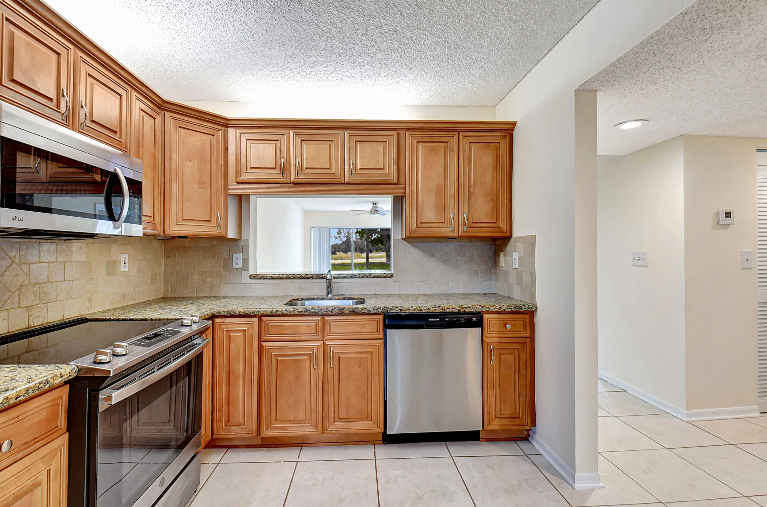 440 Northwest 67th Street, Unit H102 Boca Raton, FL 33487 - Photo 5 of 34 Kitchen
