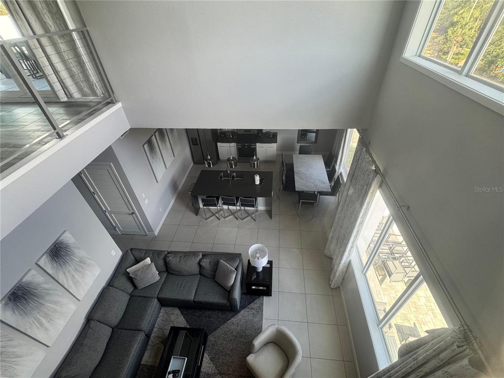 7770 Sandy Ridge Drive, Unit 210 Reunion, FL 34747 - Photo 7 of 42 a view of living room with furniture and window