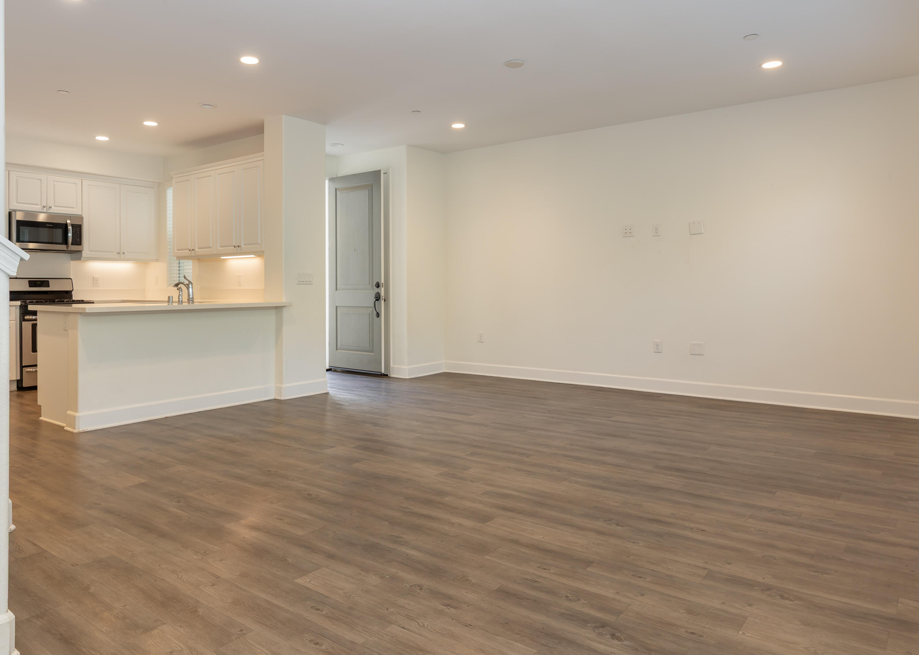243 Deming Way Buellton, CA 93427 - Photo 6 of 28 a view of an empty room with kitchen appliances and a window