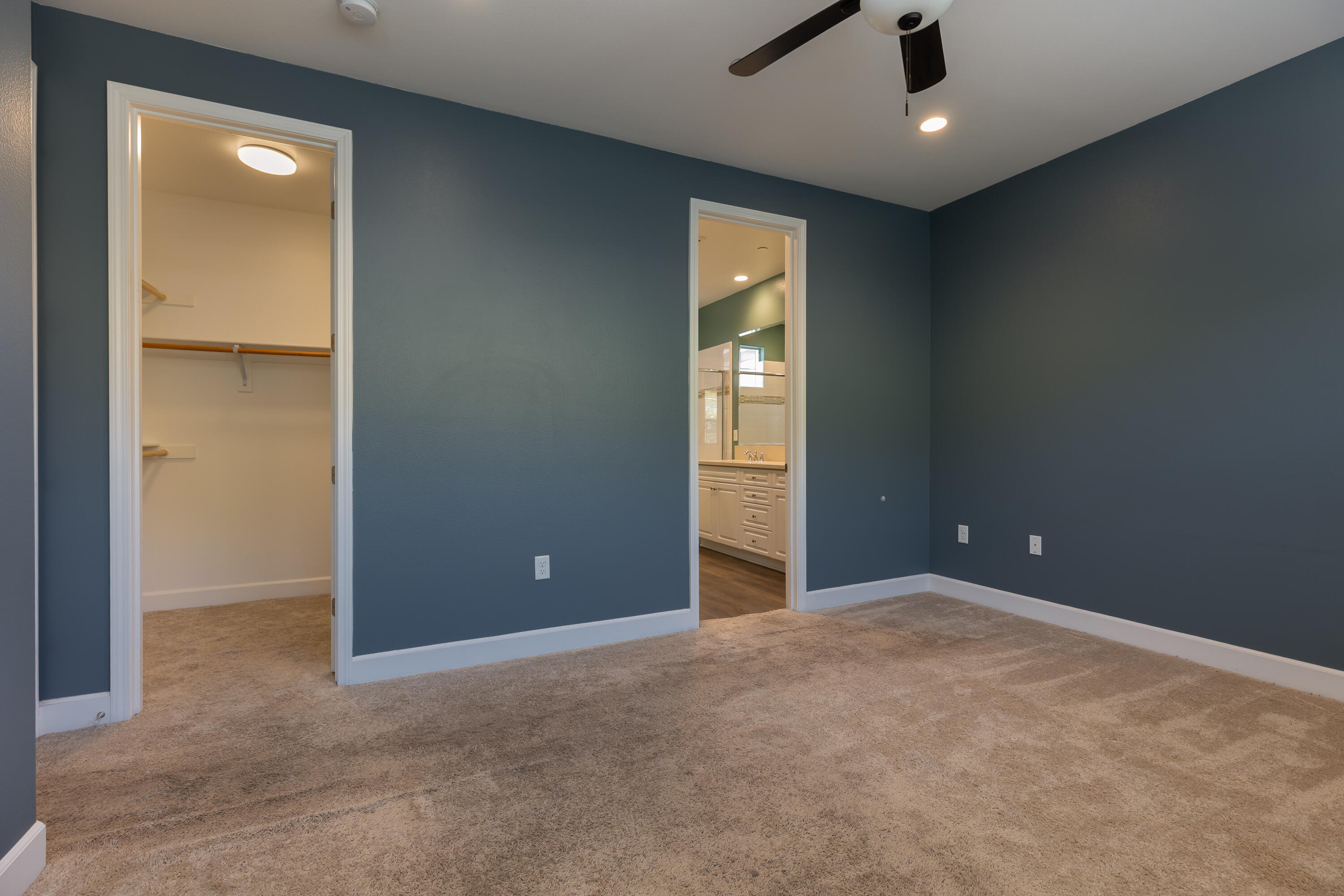 243 Deming Way Buellton, CA 93427 - Photo 8 of 28 an empty room with closet and windows
