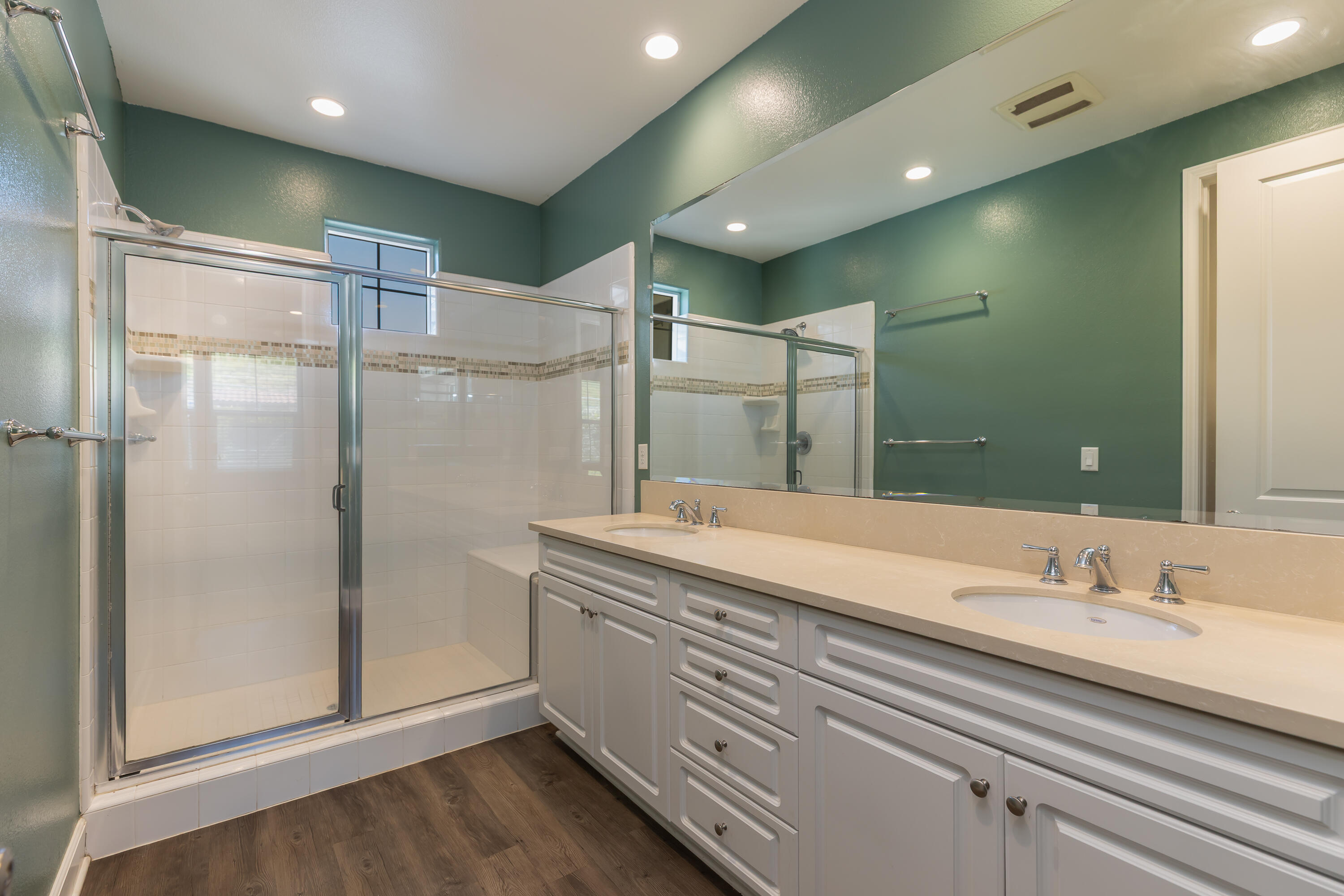 243 Deming Way Buellton, CA 93427 - Photo 9 of 28 a bathroom with a double vanity sink mirror and shower