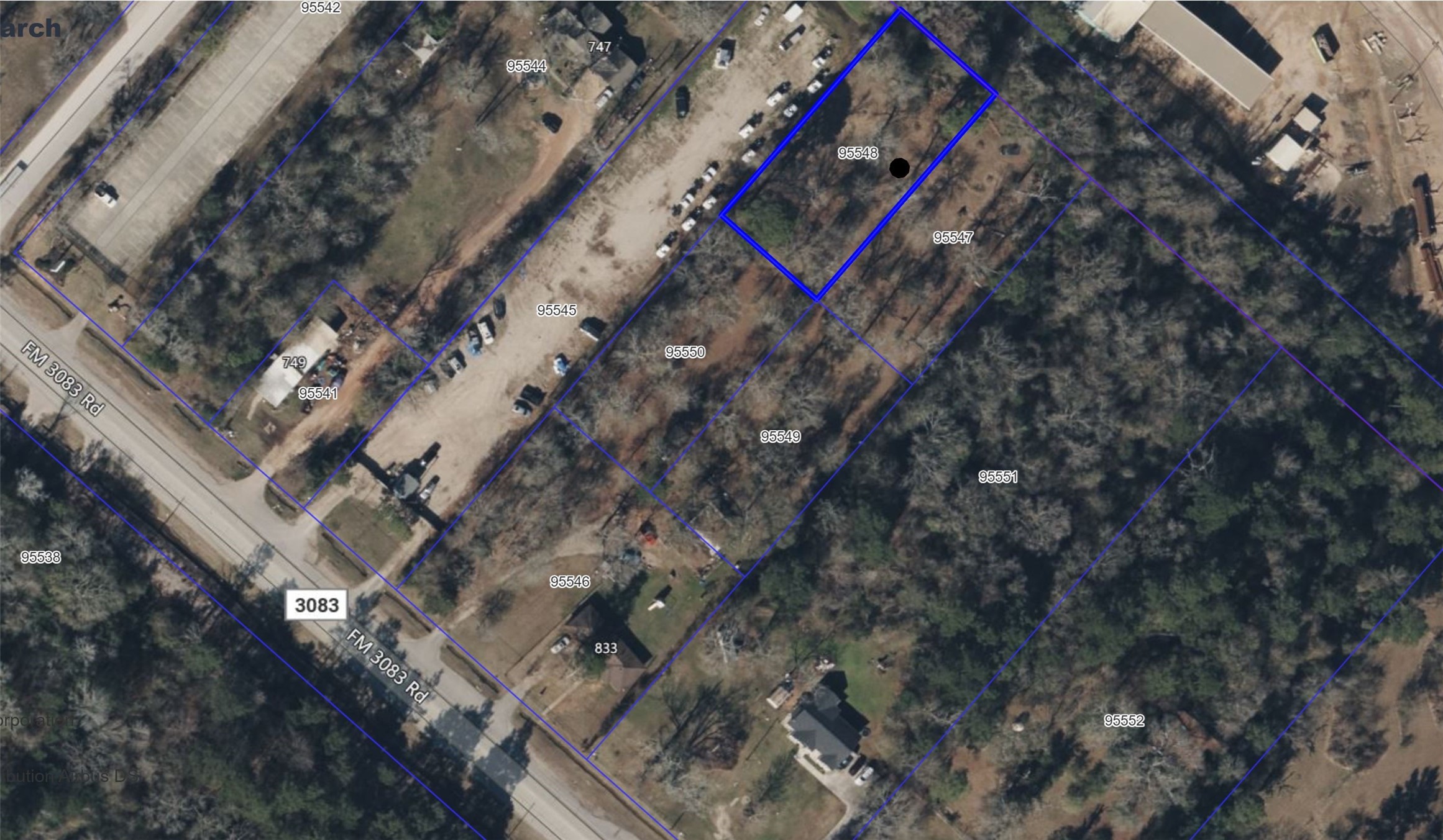 765 Fm 3083 Road Conroe, TX 77301 - Photo 3 of 12 a city view with tall buildings