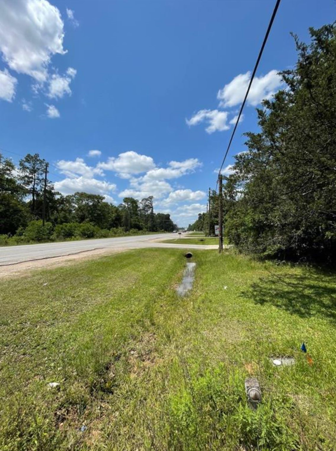 765 Fm 3083 Road Conroe, TX 77301 - Photo 10 of 12 a view of an outdoor space yard a house swimming pool and outdoor space