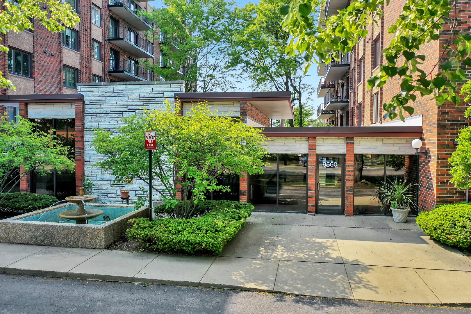 a view of a building with a garden