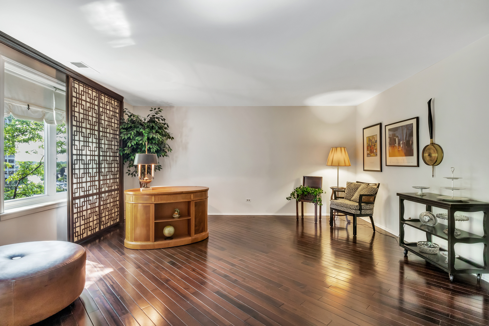 9560 Gross Point Road, Unit 509B Skokie, IL 60076 - Photo 13 of 41 a living room with furniture and a fireplace