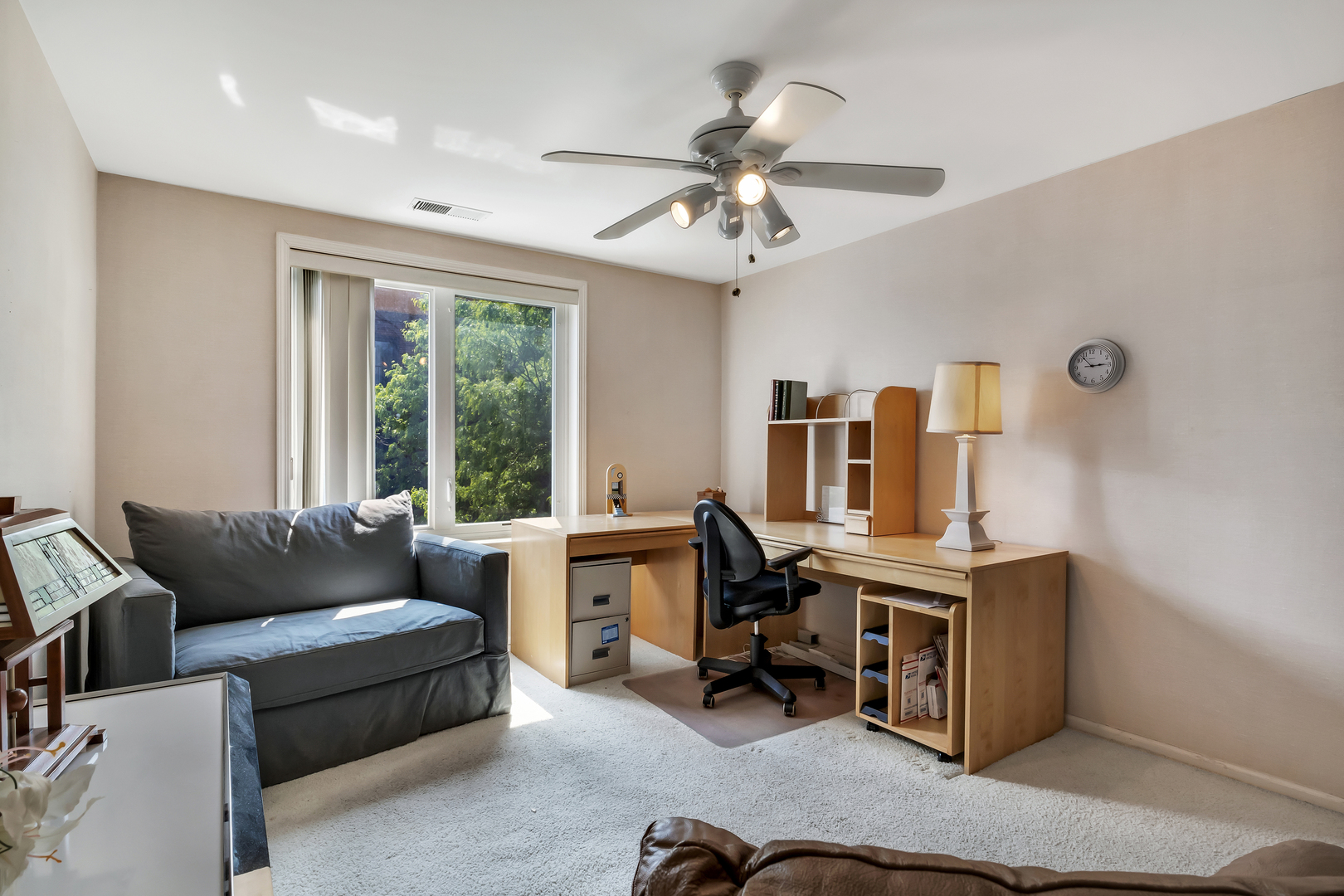9560 Gross Point Road, Unit 509B Skokie, IL 60076 - Photo 24 of 41 a living room with furniture and a window