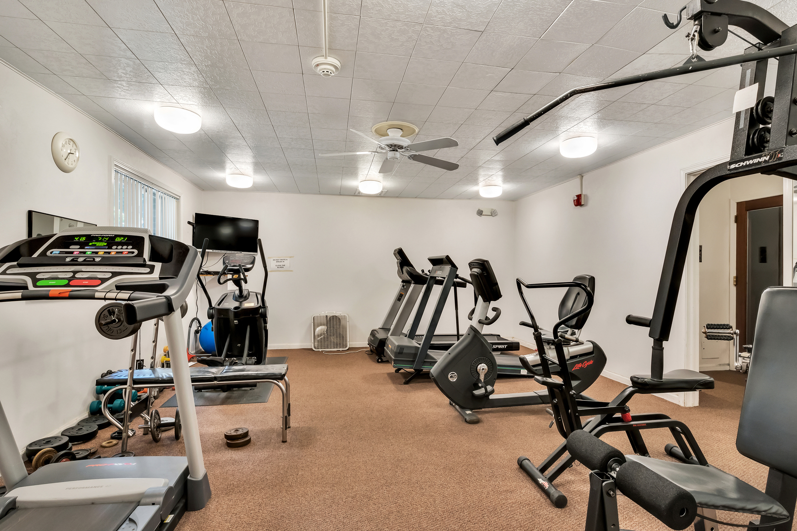 9560 Gross Point Road, Unit 509B Skokie, IL 60076 - Photo 29 of 41 a view of a room with gym equipment