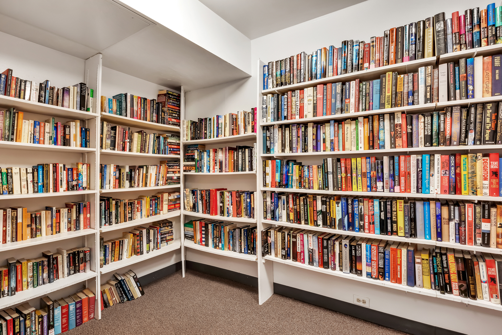 9560 Gross Point Road, Unit 509B Skokie, IL 60076 - Photo 32 of 41 a book room with furniture and a book shelf
